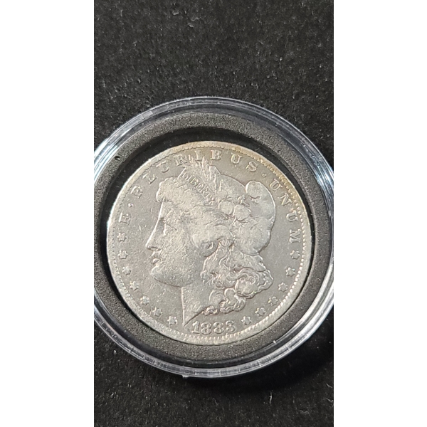 1883-O 90% Silver Morgan Dollar In Coin Capsule