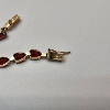 Image 3 : Stunning 14K Yellow Gold Tennis Bracelet w/ Red Gemstones - 8" - Total Weight: 7.4g