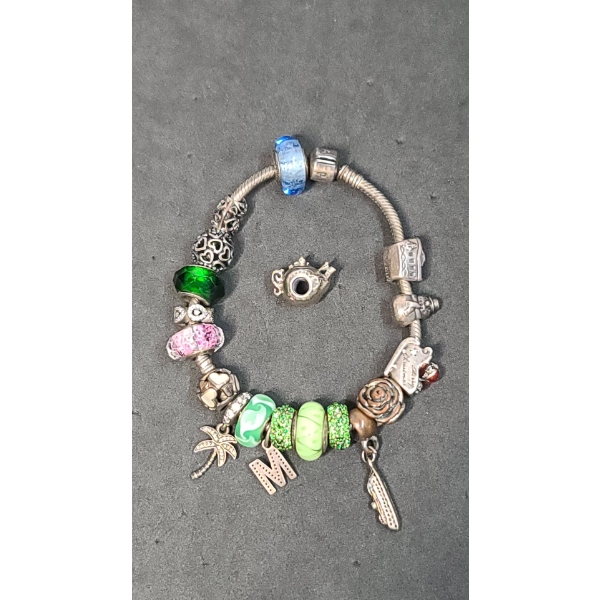 Pandora .925 Sterling Silver Charm Bracelet With Many .925 Sterling Charms - 67.5 Grams Altogether