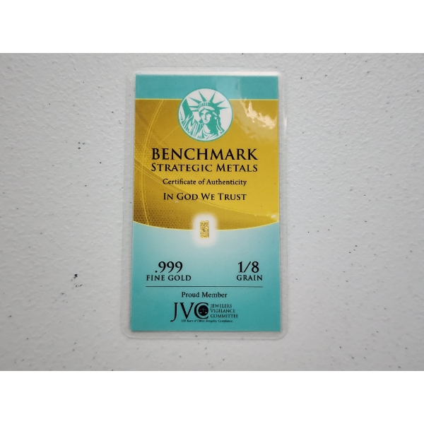 Benchmark Strategic Metals 1/8 Grain .999 Fine Gold Bar Encased in Protective Card 