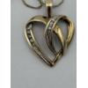 Image 3 : 10K Heart Necklace with Diamonds - Knotted - 2.3 Grams 