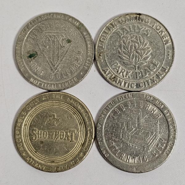 Collection Of Four One Dollar Vintage Atlantic City Casino Gaming Tokens