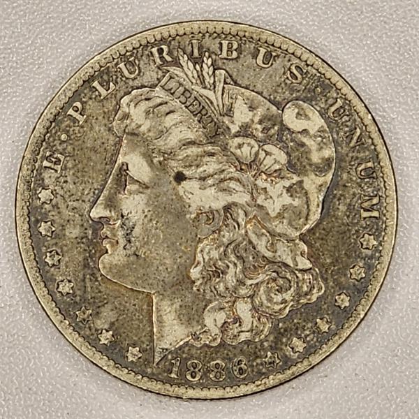 1886-O Morgan 90% Silver Dollar