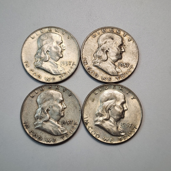 Four 1957-D United States 90% Silver Franklin Half Dollars - FV: $2.00