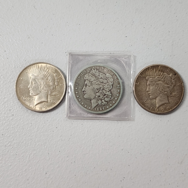 Three United States 90% Silver Dollars: 1922 Peace, 1926 Peace, & 1884-O Morgan FV: $3.00