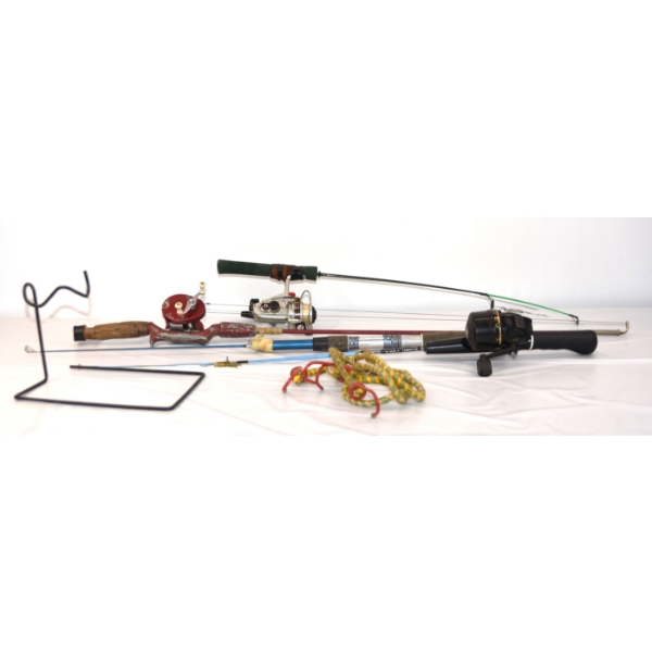 Bucket of Ice Fishing Poles and Reels 