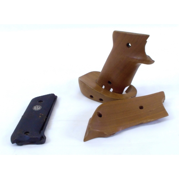 1 Original Ruger MK I 22 Pistol Grips, 1 Herrett Custom Ruger MK I 22 R.H. Target Grips