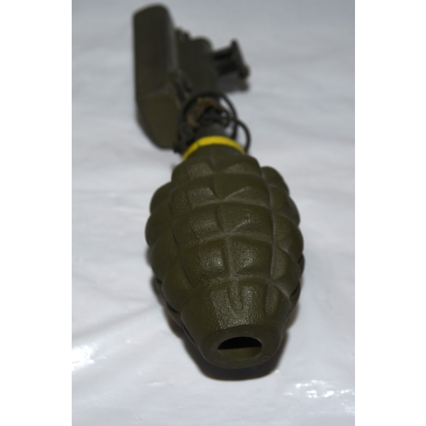 M67-Style Training Grenard Resting On A Handwritten List