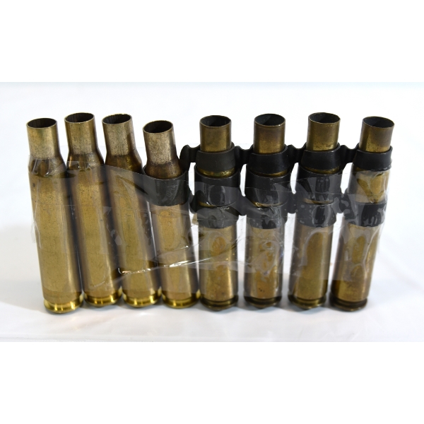 8 Pieces 50cal. Unprimed Brass & Clip