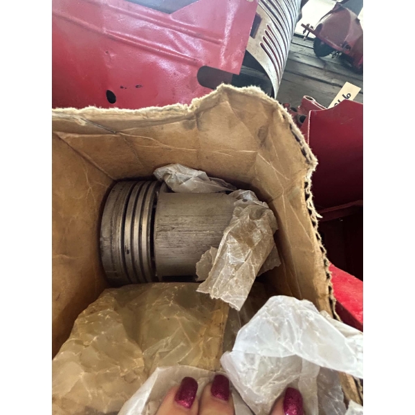 Box of Vintage Tractor Pistons