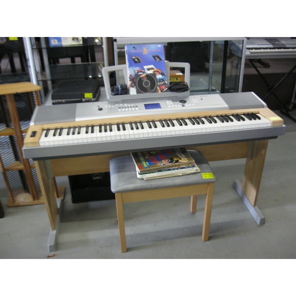 YAMAHA ELECTRIC PORTABLE GRAND PIANO W/ASST. BOOKS, CD & BENCH