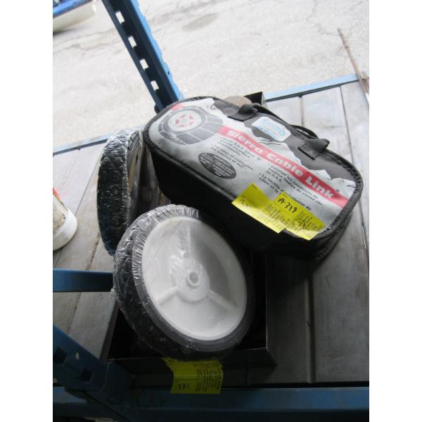 TRAY W/MISC. PIPE WRENCH, NEW WHEELS, TIRE CHAINS, ETC.
