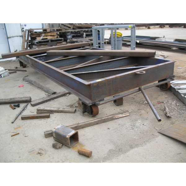 LG. STEEL STRUCTURE ON CASTORS, APPROX. 6'X14'