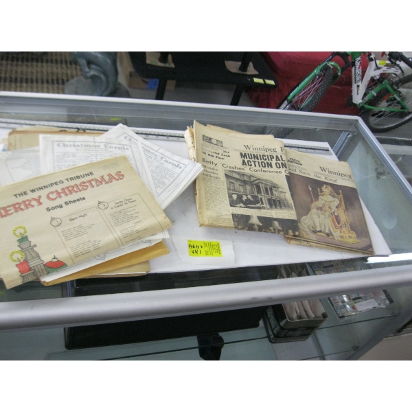 STACK OF OLD NEWSPAPERS