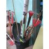 Image 2 : BLACK GARBAGE CAN W/MISC. GARDEN TOOLS, DÉCOR, BAMBOO STAKES, ETC.