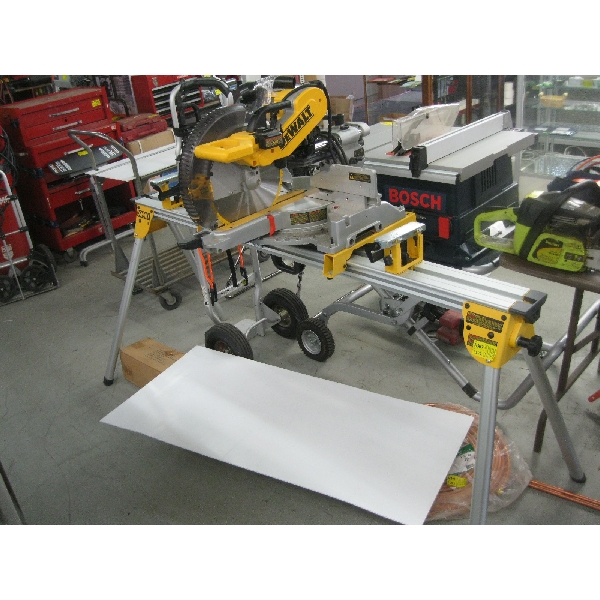 DEWALT SLIDING COMPOUND MITER SAW ON DEWALT STAND