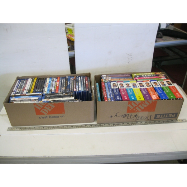 2 BOXES OF DVDs