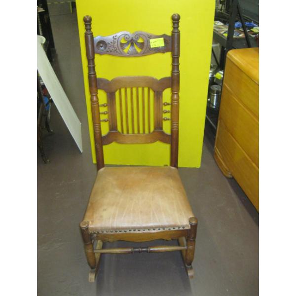 TALL BACK CARVED PADDED SEAT ANTIQUE ROCKING CHAIR