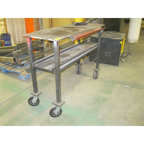 METAL TOPPED TABLE ON CASTORS - 4'X19"