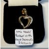 Image 1 : 10 KT HEART PENDANT W/SM. DIAMONDS, 2GR