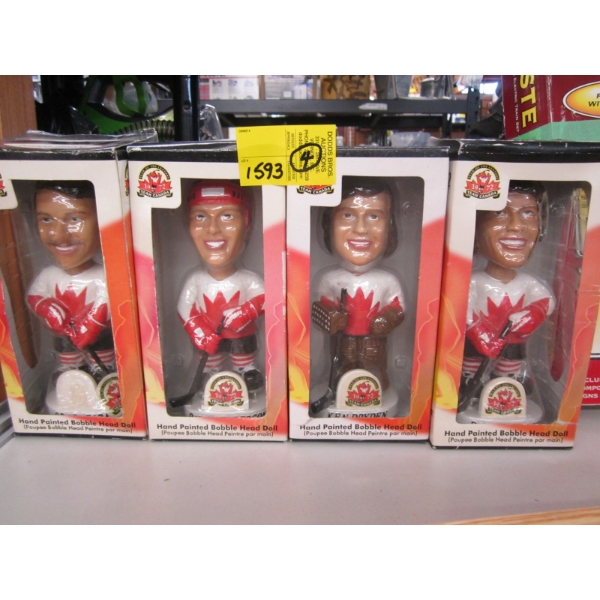 4 HAND PAINTED BOBBLE HEAD DOLLS