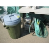 Image 1 : 2 GARBAGE CANS, 2 HOSES & BASKET OF GARDEN SUPPLIES