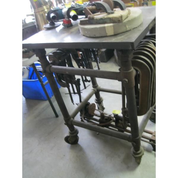 HEAVY DUTY METAL TOP WORK TABLE ON CASTORS