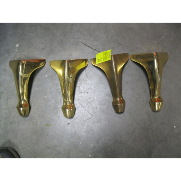 SET OF GOLD COLORED STOVE LEGS