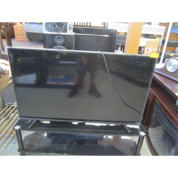 55" SHARP FLATSCREEN TV - CRACKED FOOT, NO REMOTE