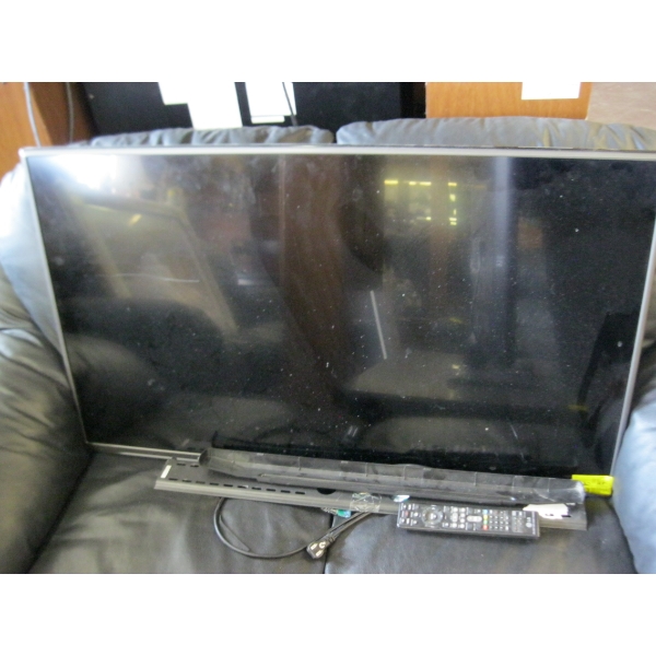 WALL MOUNT 42" LG TV W/REMOTE (SCRATCH ON SCREEN)
