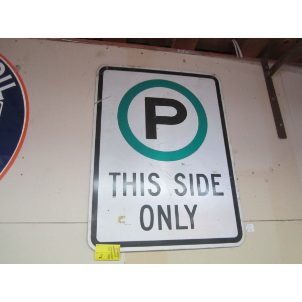 PARKING THIS SIDE ONLY SIGN