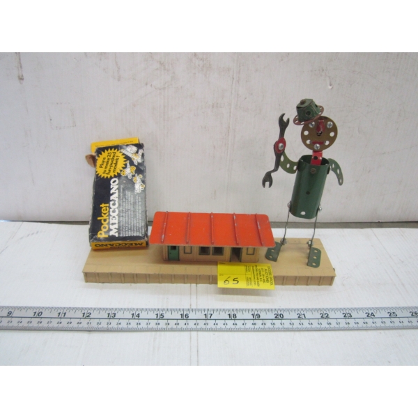 MECCANO MAN W/SOME MECCANO PIECES & SM. BUILDING