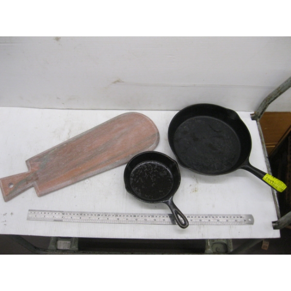 2 CAST IRON FRY PANS & A FISH SERVING BOARD