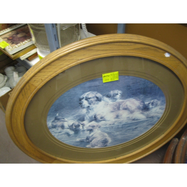 LG. OVAL FRAMED PICTURE OF DOGS