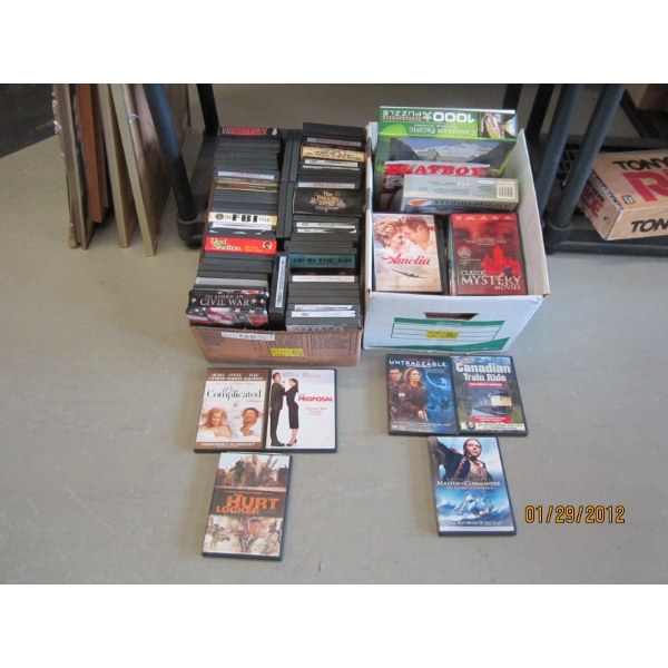 2 BOXES OF DVDs