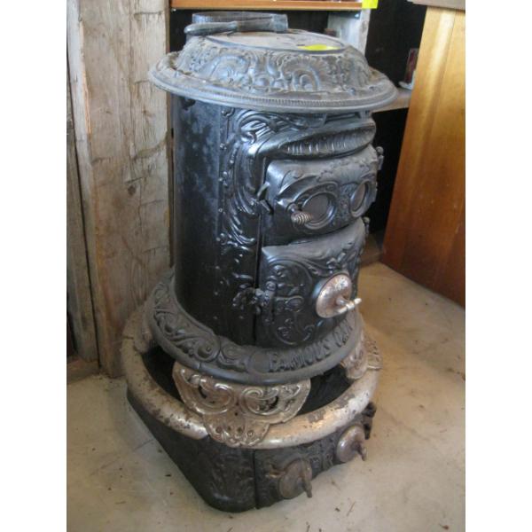 MCCLARY FAMOUS OAK CAST IRON STOVE - MISSING BASE