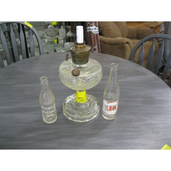 2 VINTAGE BEVERAGE BOTTLES & A COAL OIL LAMP BASE