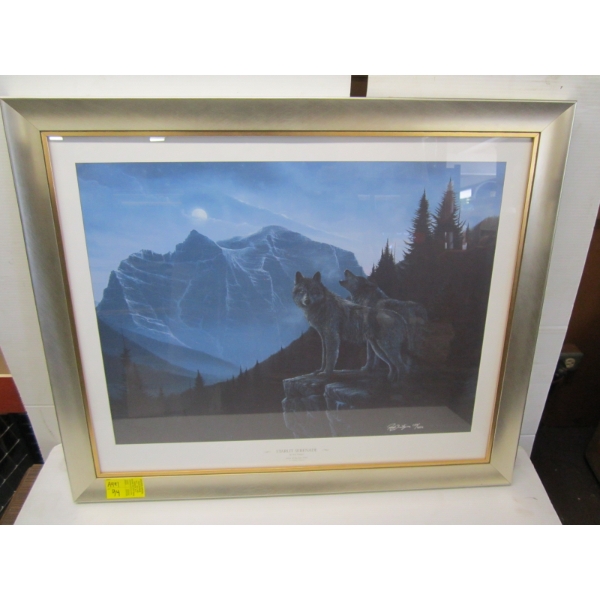 FRAMED NUMBERED PRINT OF THE WOLVES BY ROD TRIBEGER