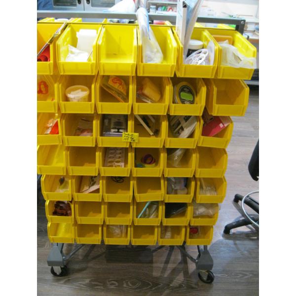 CONTENTS OF ONE SIDE OF YELLOW STORAGE BIN UNIT - CONTENTS ONLY