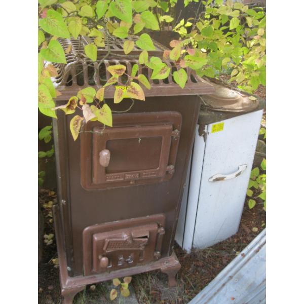 2 WOODSTOVES - GARBAGE BURNER & AN ENAMEL CASED