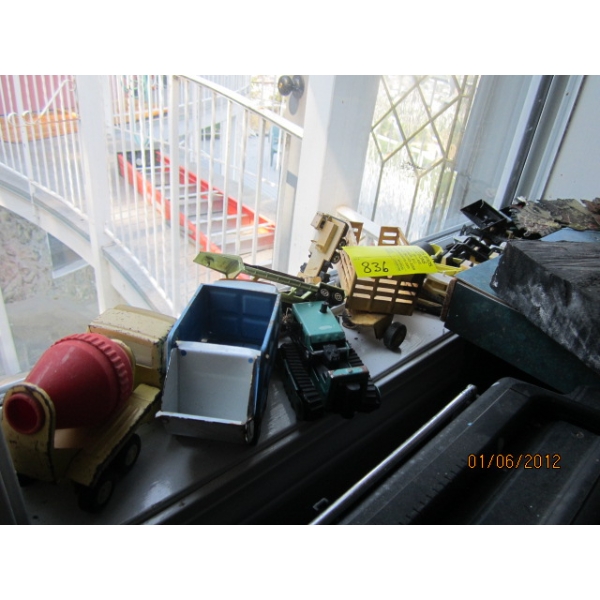 SHELF W/MISC. - SM. TRACTORS, TRUCK, ETC.