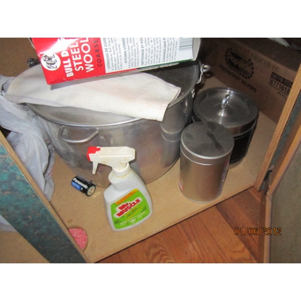CONTENTS OF CABINET UNDER COMMERCIAL ITEMS - PLATES, BOWLING PIN, WATER PITCHER, LG. POT, ETC.
