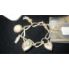 Image 2 : SILVER .925 BRACELET W/ASST. CHARMS