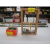 Image 1 : FISHING LINE HOLDER W/VARIOUS HOOKS & BOBBERS & A SHAKESPEARE REEL