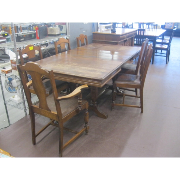 WALNUT ANTIQUE DINING TABLE W/6 CHAIRS & 3 LEAVES