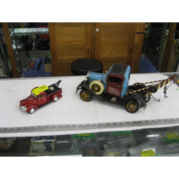 2 TOW TRUCKS