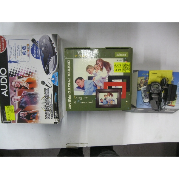 MISC. CASSIO MP3 WATCH W/CHARGER & ACCESS. & A KARAOKE CONSOLE & 7" LCD PICTURE FRAME