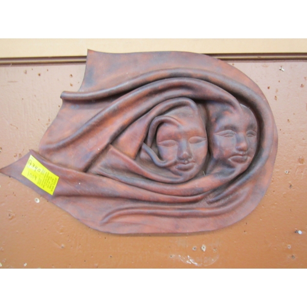 LEATHER WALL HANGING OF 2 FACES