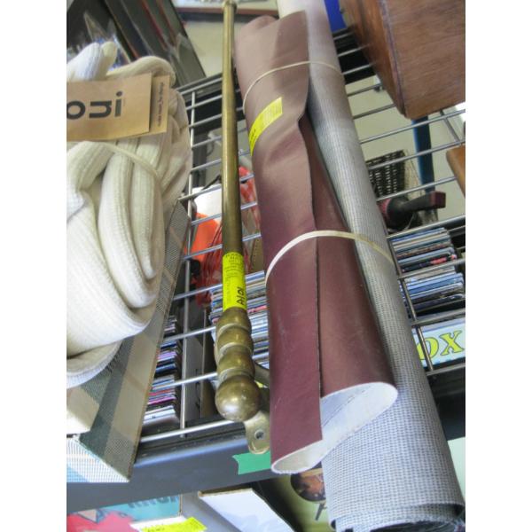 BRASS WALL MOUNT PANT RACK & ROLL OF ASST. VINYL MATERIAL