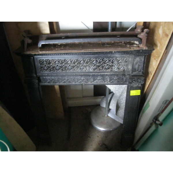 CAST METAL FIREPLACE SURROUND